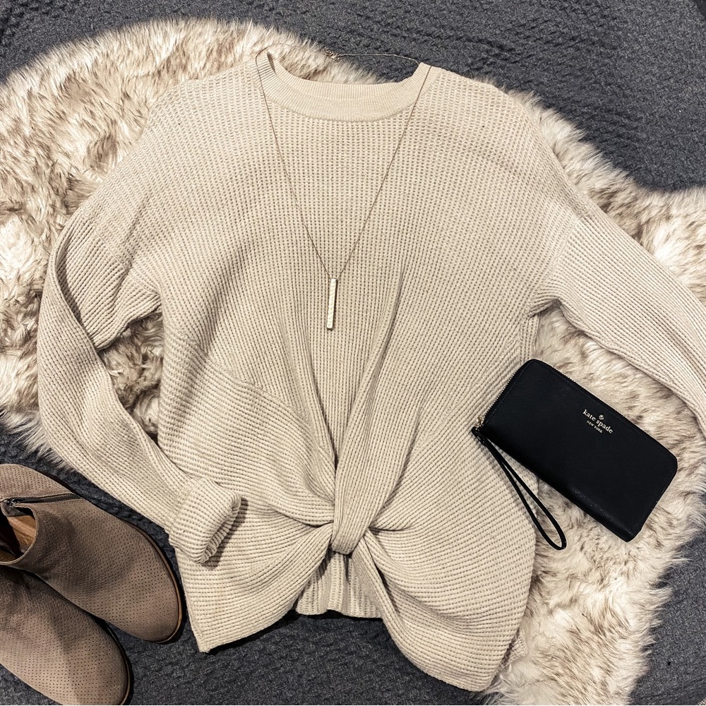 Love Stitch front knot sweater